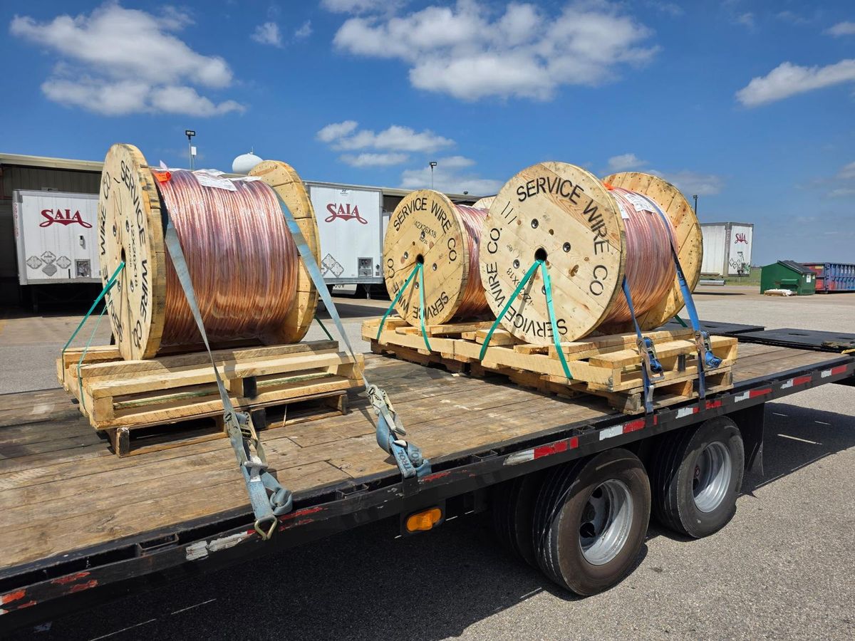 Copper wire reels secured on a flatbed